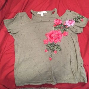 Off the shoulder army green shirt.